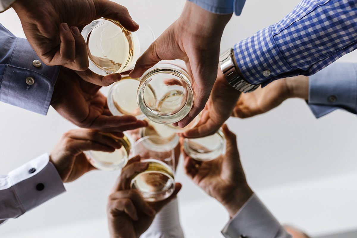 urban-row-photo-groomsmen-whiskey-cheers-canopy-harbor-point-baltimore_0005.jpg